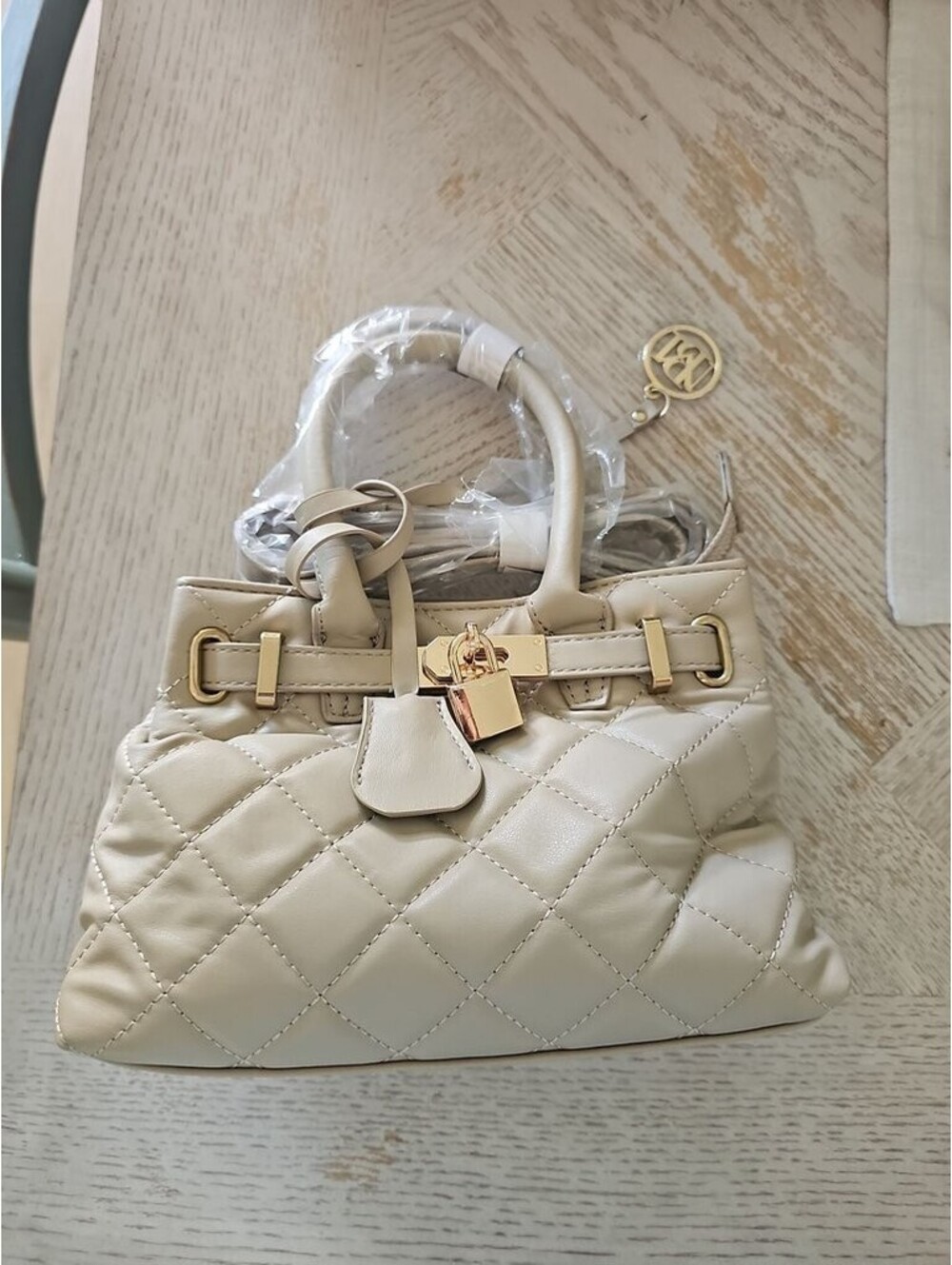 Badgley Mischka Quilted Beige Handbag with Gold Accents